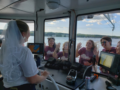 Helping Captain Harley at the helm.